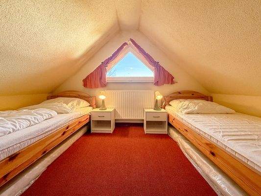 Gemütliches Zimmer im Dachgeschoss