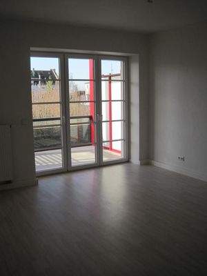 Wohnzimmer mit Balkon