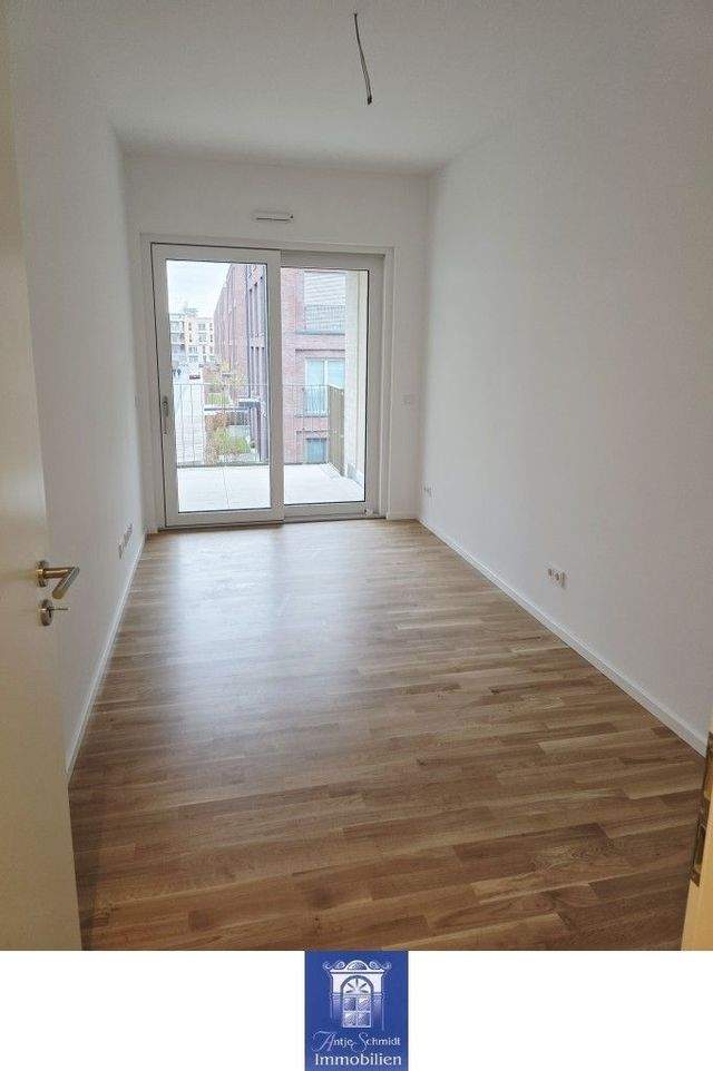 Ihr neuer, attraktiver Lieblingsplatz mit Balkon an der Elbe! Erstbezug in der HafenCity! - Photo 1