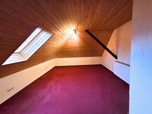 Schlafzimmer 1 im Obergeschoss.png