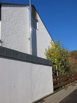 Ansicht Ostseite mit Edelstahlkamin.JPG