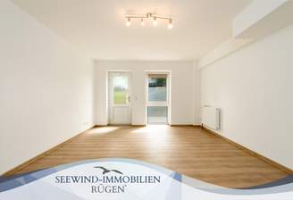 Das helle Zimmer und der Wohnungseingang