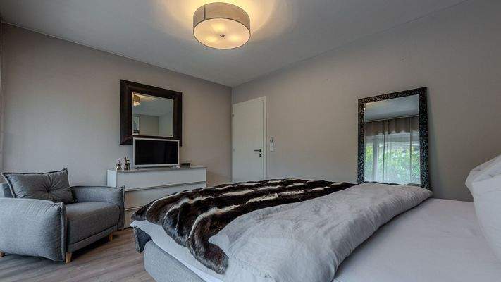 KITZIMMO-Hochwertige Haushälfte am Golfplatz kaufen - Immobilien Kitzbühel.