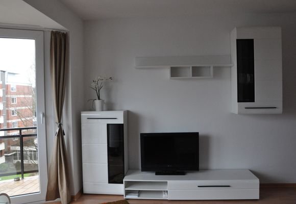 Wohnzimmer, Schrankwand mit Fernseher