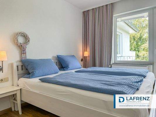 Schlafzimmer mit Balkon