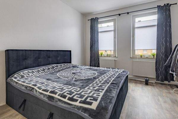 Freundlich gestaltetes Schlafzimmer mit ausreichend Stellfläche | Wohnung im 2. Obergeschoss