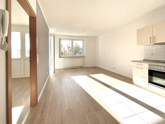 Wohnen mit Blick ins Schlafzimmer