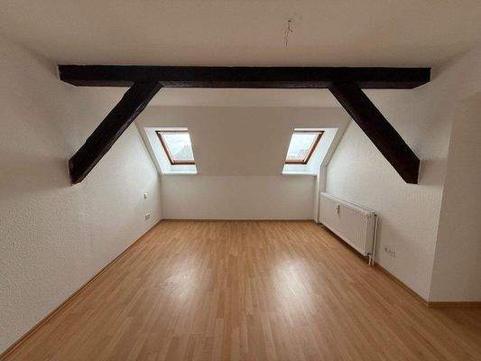 Schlafzimmer einer Wohnung im DG