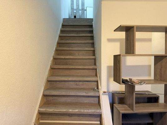 Treppenaufgang in das Dachgeschoss