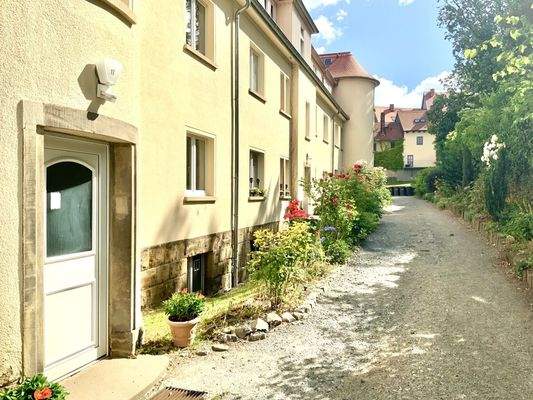 Begrünte Hauszugänge