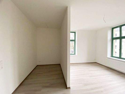 Schlafzimmer mit Ankleideraum