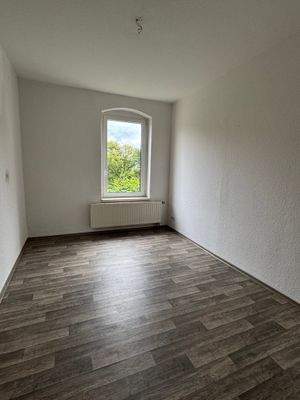 Büro an Schlafzimmer