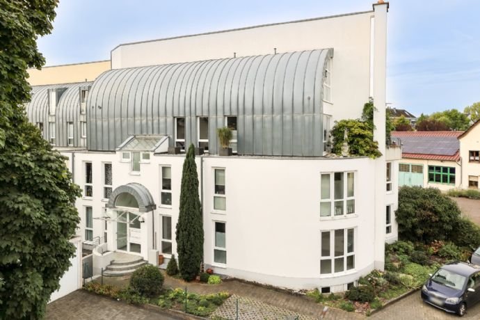 Erdgeschosswohnung mit XL-Balkon und Tiefgaragenstellplatz