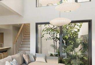 Wohnzimmer mit Wintergarten