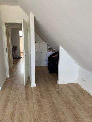 Schlafzimmer mit Ankleidebereich