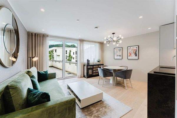 Der helle Wohn-/Koch-/ Essbereich in der unteren Etage