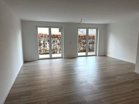 Wohn-/ Essbereich mit Terrasse