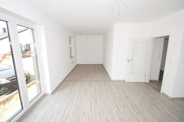 Kochbereich grenzt an das Wohnzimmer an. EBK kann erworben werden.