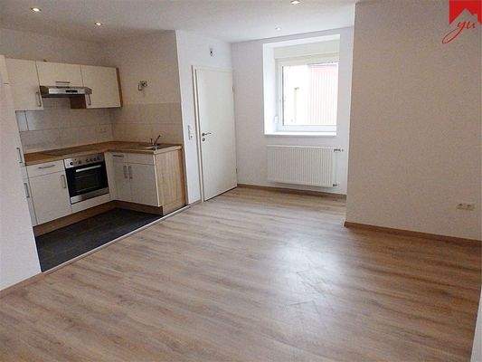 Whg. 3: offene Küche mit Wohn- und Essbereich