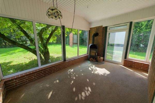 Wintergarten Reetdachhaus