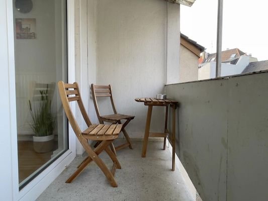 Balkon mit Sitzgelegenheit