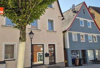 Ansicht Haus mit Laden