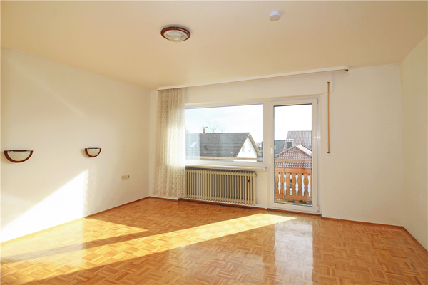 Schlafzimmer mit Zugang zum Balkon