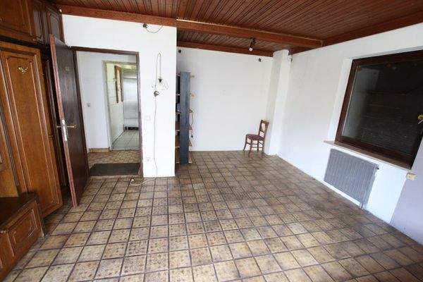 Wohn- und Geschäftshaus in Keutschach-Höflein mit 1.892m² Grundstück und 3 XXL-Garagen Nähe Rauschelesee mit vielen Verwendungsmöglichkeiten!