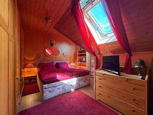 Schlafzimmer in Wohnung 2