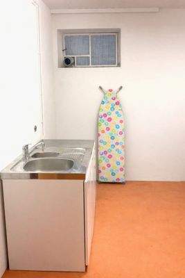 Waschküche (KI generiert)