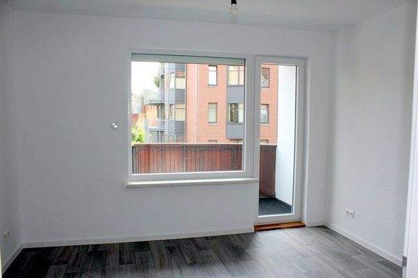 Schlafzimmer mit Balkonausgang