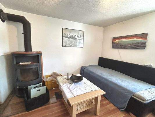 Obergeschoss: Zimmer mit Schwedenofen