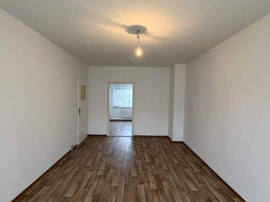 Schlafzimmer mit angrenzendem Raum