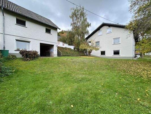 Doppelgarage + Wohnhaus 