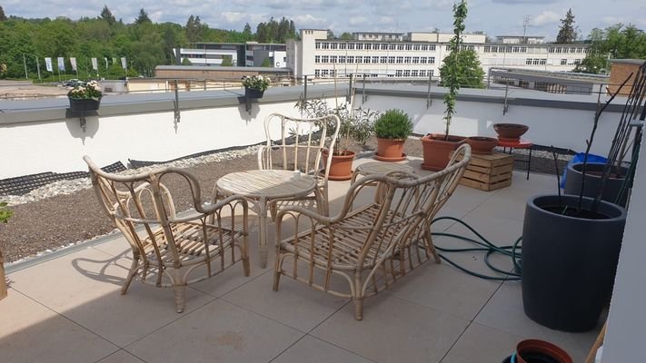 Dachterrasse mit Sicht auf Sonnenuntergänge