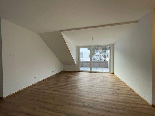 Schlafzimmer mit Zugang zum Balkon