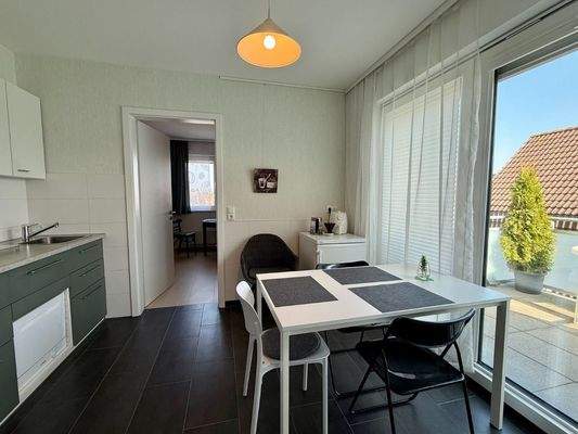 Wohnküche mit Balkon