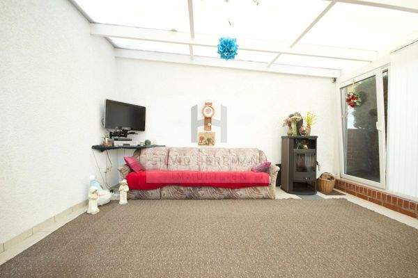 Wintergarten mit Kamin