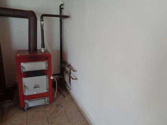 Zentraheizung auch mit Holz heizbar in Garage