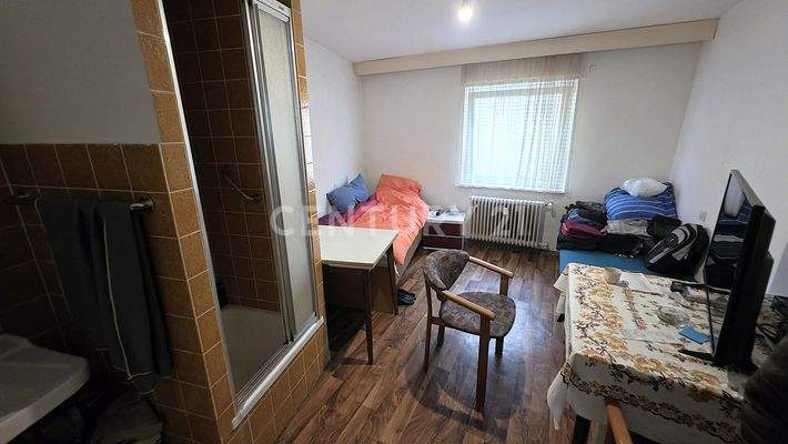 Bild eines Einzimmer Appartements von insgesamt 8