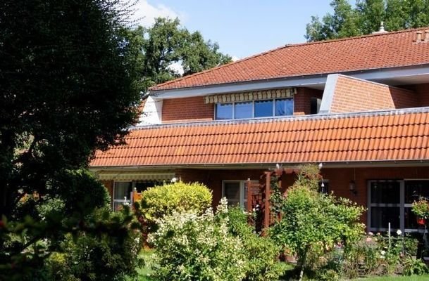 Wohnung im Obergeschoss links mit großer Terrasse