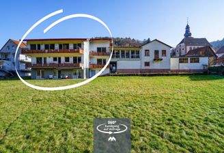 Mietshaus von Westen