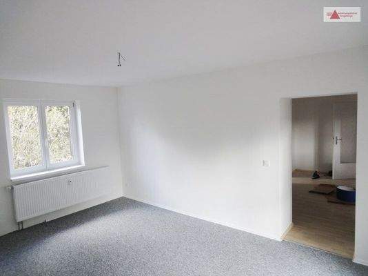 Wohnzimmer gr. Whg. 1. OG