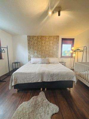 Wohnung im DG Schlafzimmer 