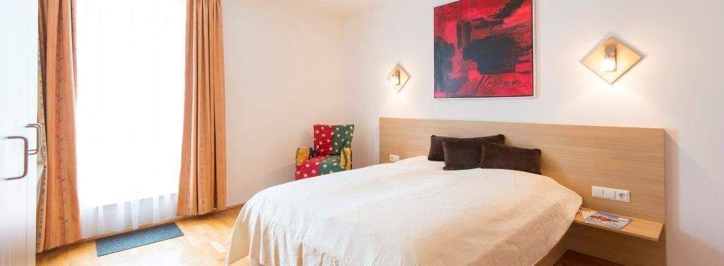 Schlafzimmer mit Balkon