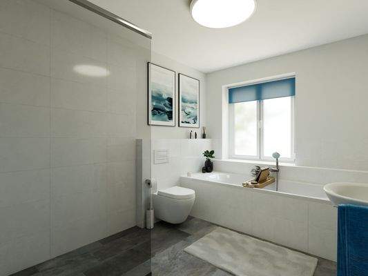 Das Badezimmer mit Walk-In-Dusche und Badewanne