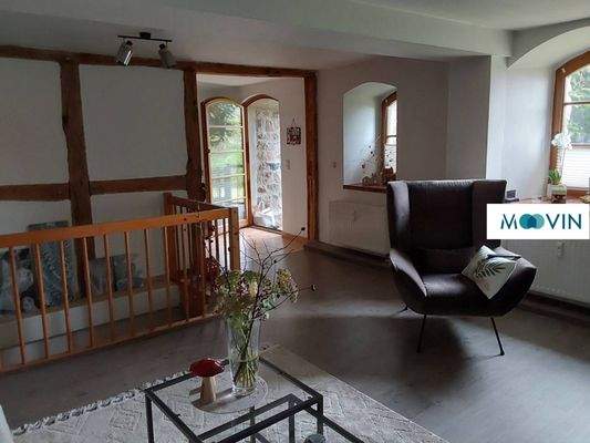 Ansicht II: Wohn- und Esszimmer mit offenem Küchenbereich