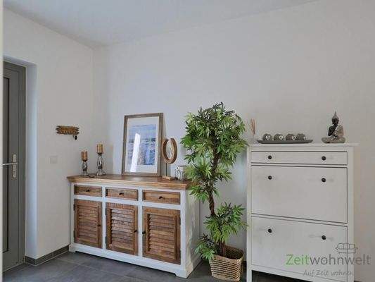 Kommode und Schuhschrank am Eingang