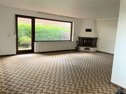 Wohnzimmer mit Kamin