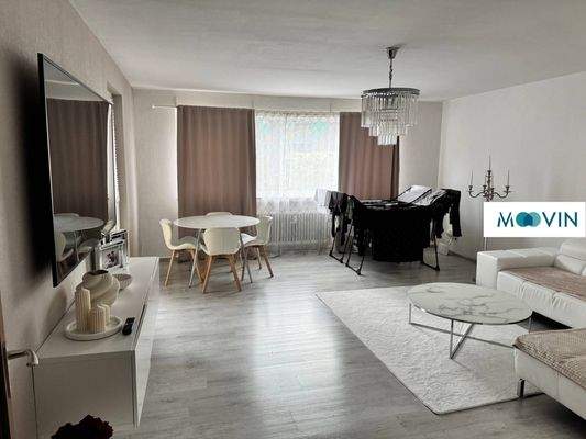 Ansicht I: Wohn- und Esszimmer mit Zugang zum Balkon